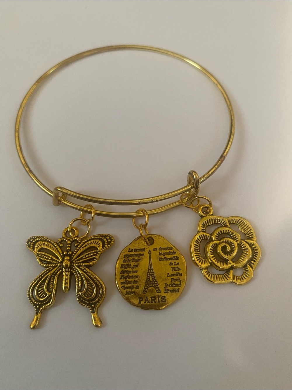 Hand Crafted Gold Charm Bangle with Butterfly, Paris Medallion & Rose